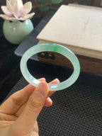 Ice-grade Jadeite Bangle with Floating Green