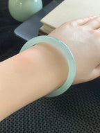 Ice-grade Jadeite Bangle with Floating Green